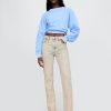 Schmale, gerade Jeans im Stil der 90er mit hohem Bund Schmale, gerade Jeans im Stil der 90er mit hohem Bund