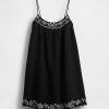 Swing-Kleid aus Baumwollgaze mit Stickerei Swing-Kleid aus Baumwollgaze mit Stickerei