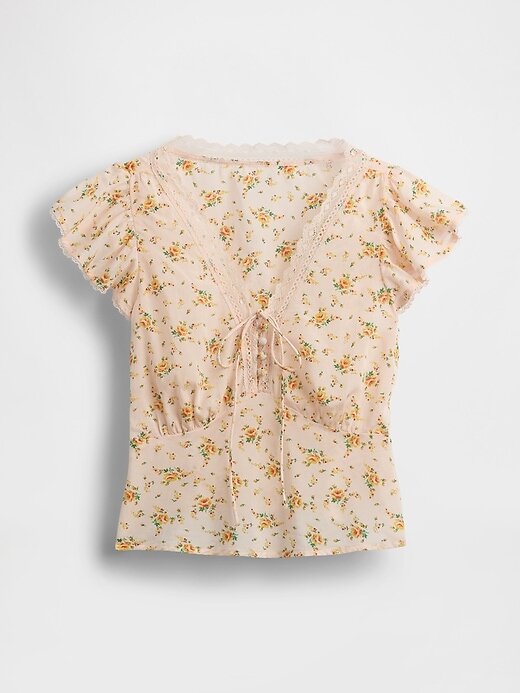 Top mit Spitzenbesatz und Blumenmuster Top mit Spitzenbesatz und Blumenmuster