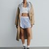Trenchcoat mit Symbol