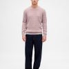 Zopfmusterpullover aus Merinowollmischung Zopfmusterpullover aus Merinowollmischung